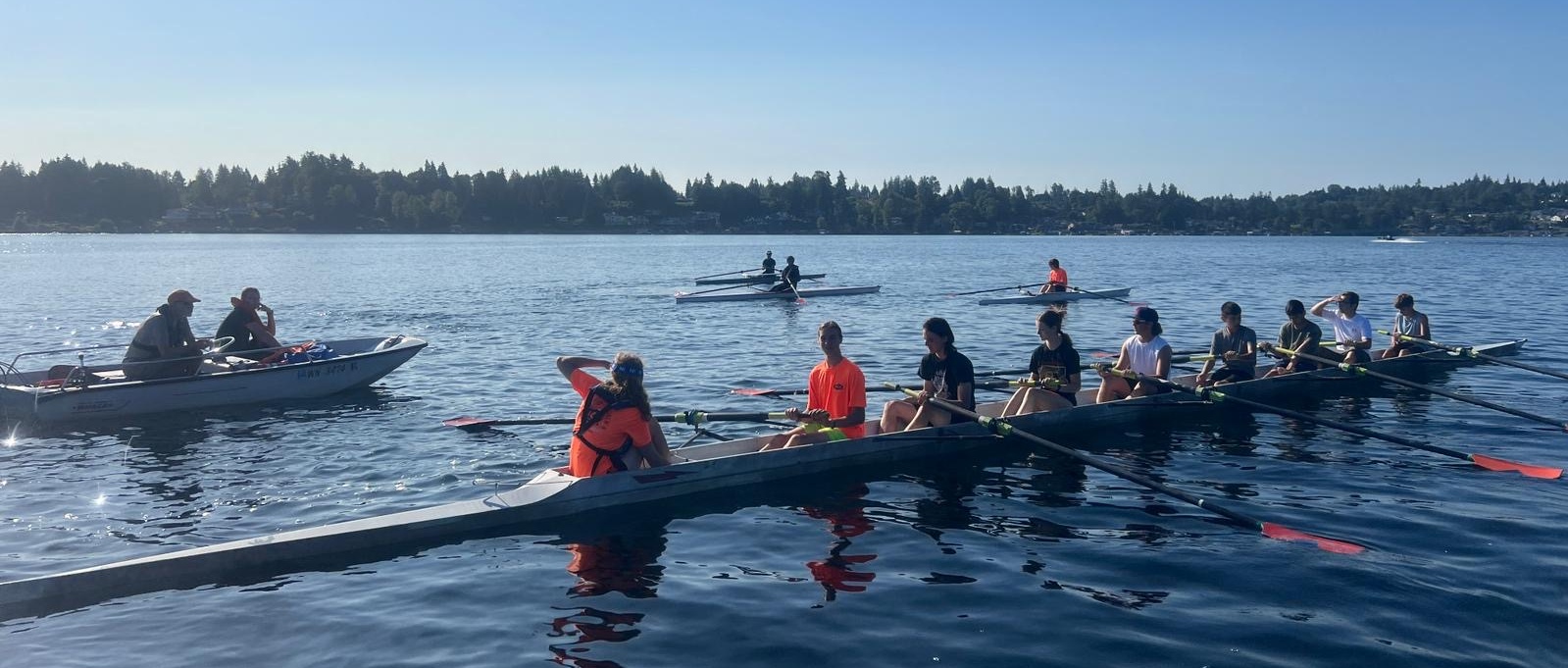 North Cascades Crew youth rowers on Lake Stevens during rowing practice